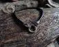 Preview: Black Solid Leather Necklace with Wolf Heads – Bold & Refined Viking Style