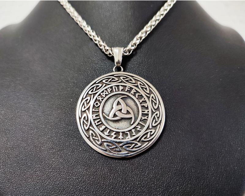 Reversible amulet, horns of Odin's side