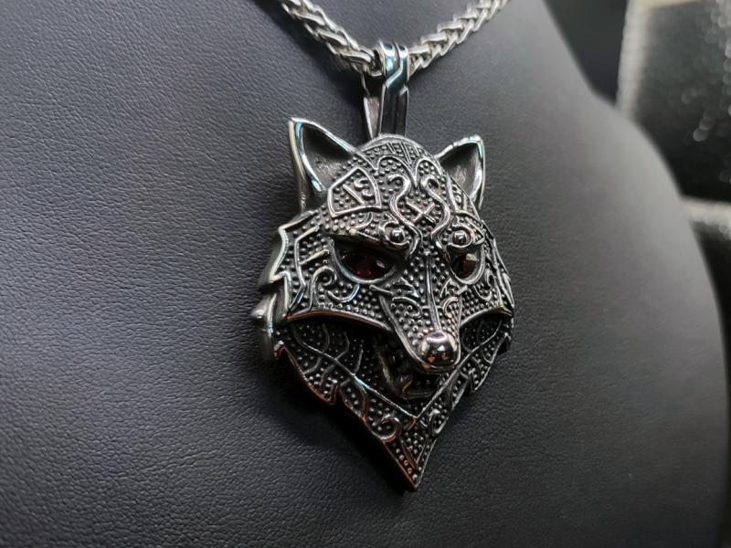 Stylized wolf head made of stainless steel
