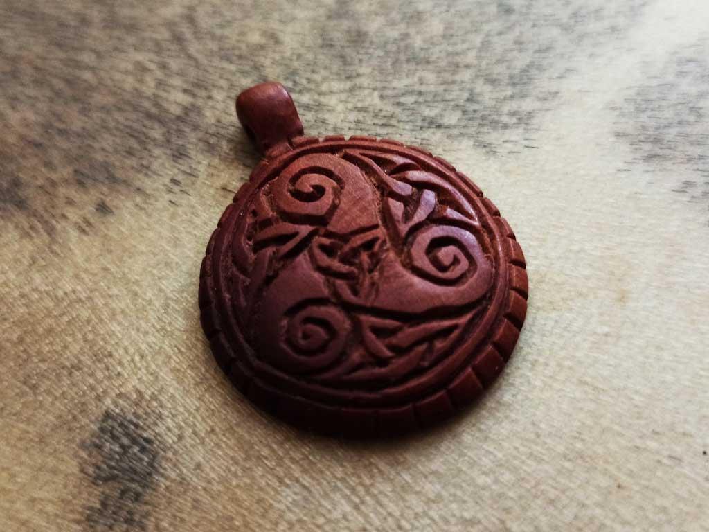 Handcrafted wooden triskeles