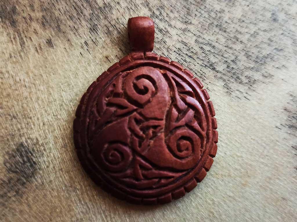 Handcrafted wooden triskeles