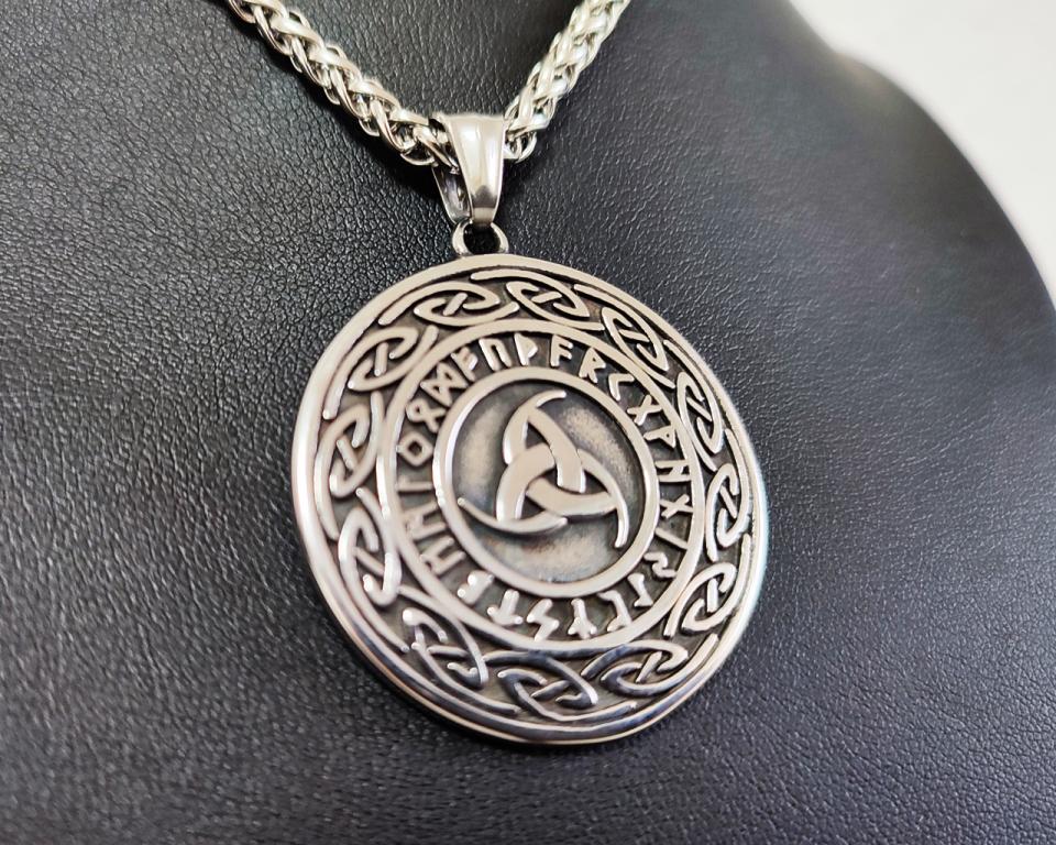 Reversible amulet, horns of Odin's side