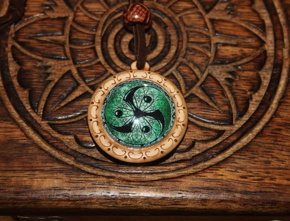 Triskelion wood pendant