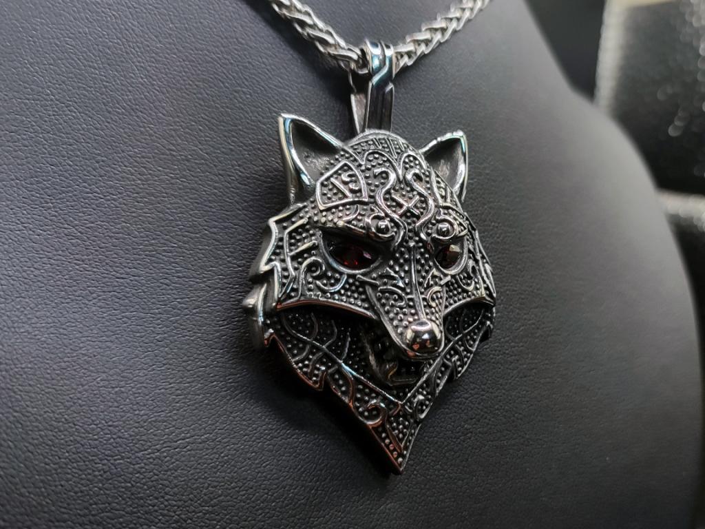 Stylized wolf head made of stainless steel