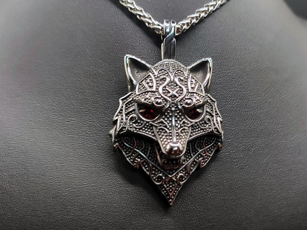 Stylized wolf head made of stainless steel