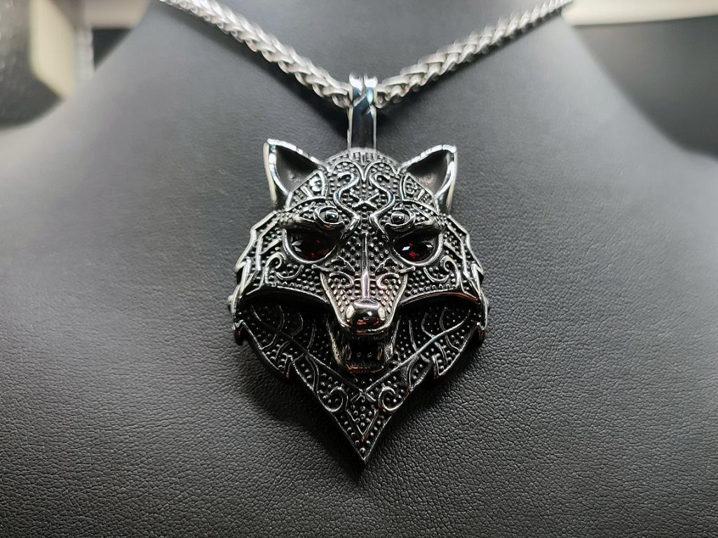 Stylized wolf head made of stainless steel