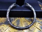 Ornate Midgard snake bangle made of stainless steel