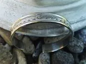 Silver bangle infinite knot