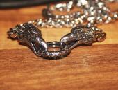Stainless steel raven necklace